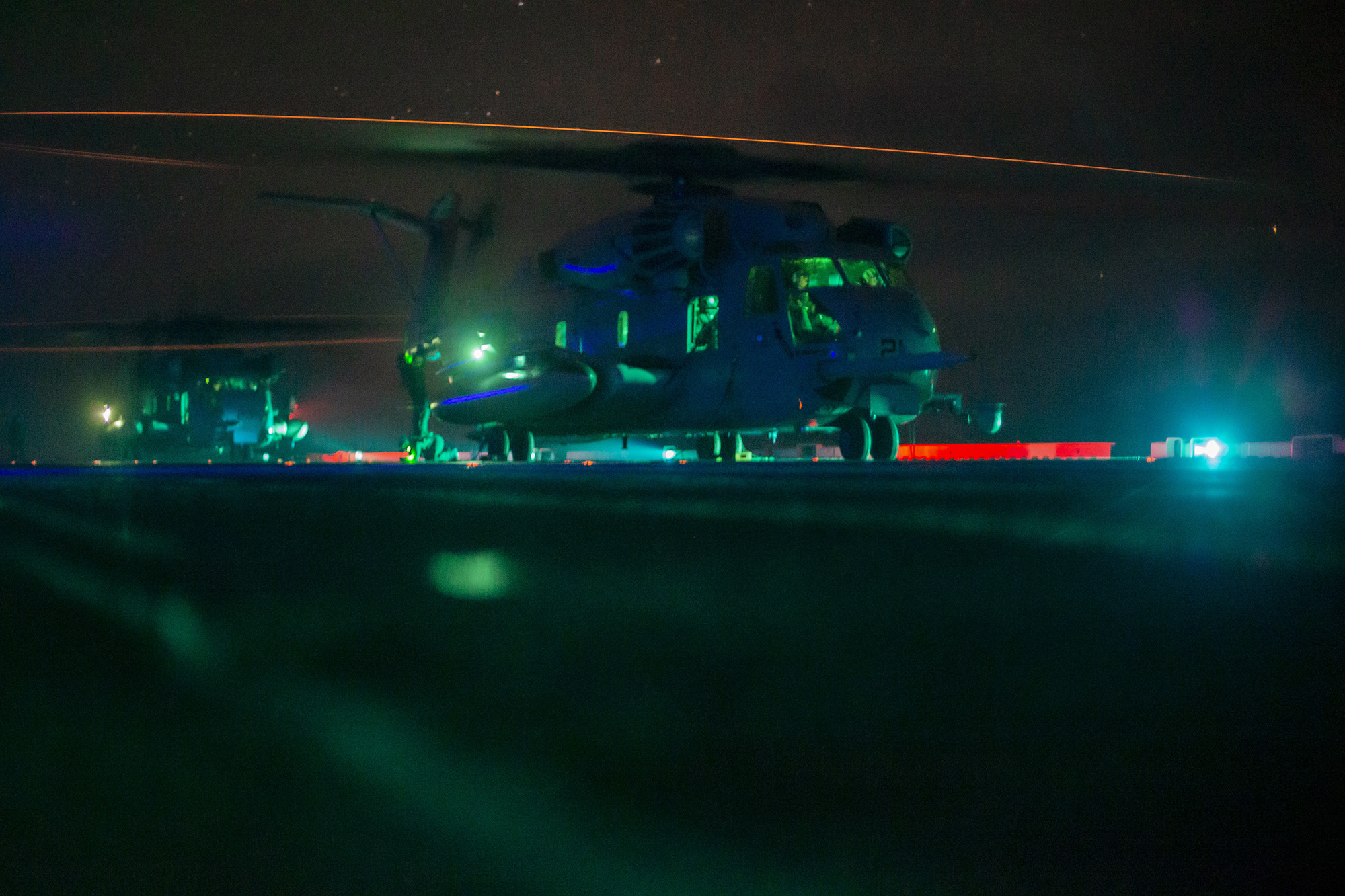 Marines in a CH-53E Super Stallion prepare for takeoff from the flight deck of the amphibious assault ship USS Makin Island (LHD 8) on Oct. 18, 2020, in the Pacific Ocean.